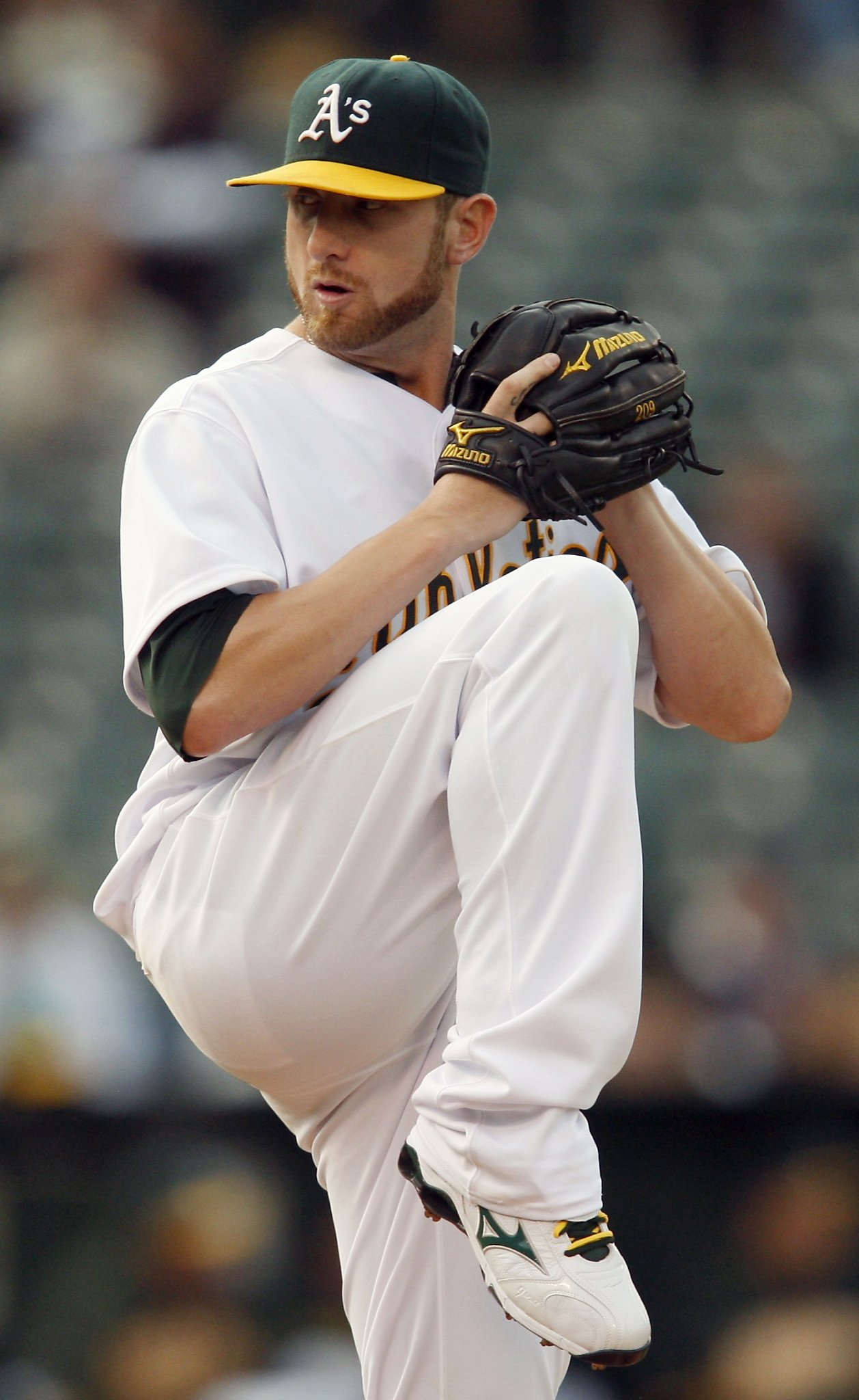 Former Oakland Athletics pitcher Dallas Braden wears a jersey of