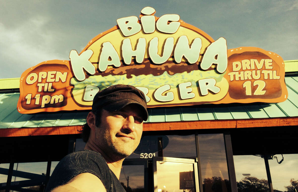 S.A. native/maverick director Robert Rodriguez poses with his Kahuna Burger set in Austin for his first TV original 'From Dusk Till Dawn': The Series'. 