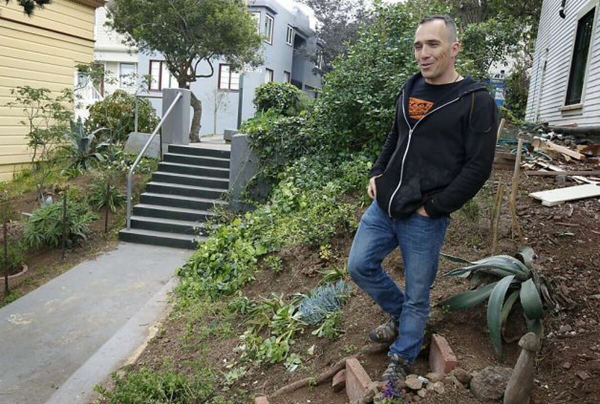 Marty Combs maintains the community garden on the Eugenia Stairs in the Bernal Heights neighborhood of San Francisco, Calif. on Thursday, March 28, 2013. Photo: Paul Chinn, The Chronicle