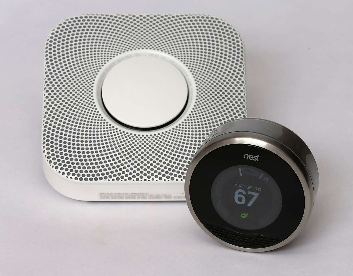 PROVO, UT - JANUARY 16: In this photo illustration, a Nest thermostat (R) and a smoke/carbon monoxide detector is seen on January 16, 2014 in Provo, Utah. Google bought Nest, a home automation company, for $3.2 billion taking Google further into the home ecosystem. (Photo illustration by George Frey/Getty Images)