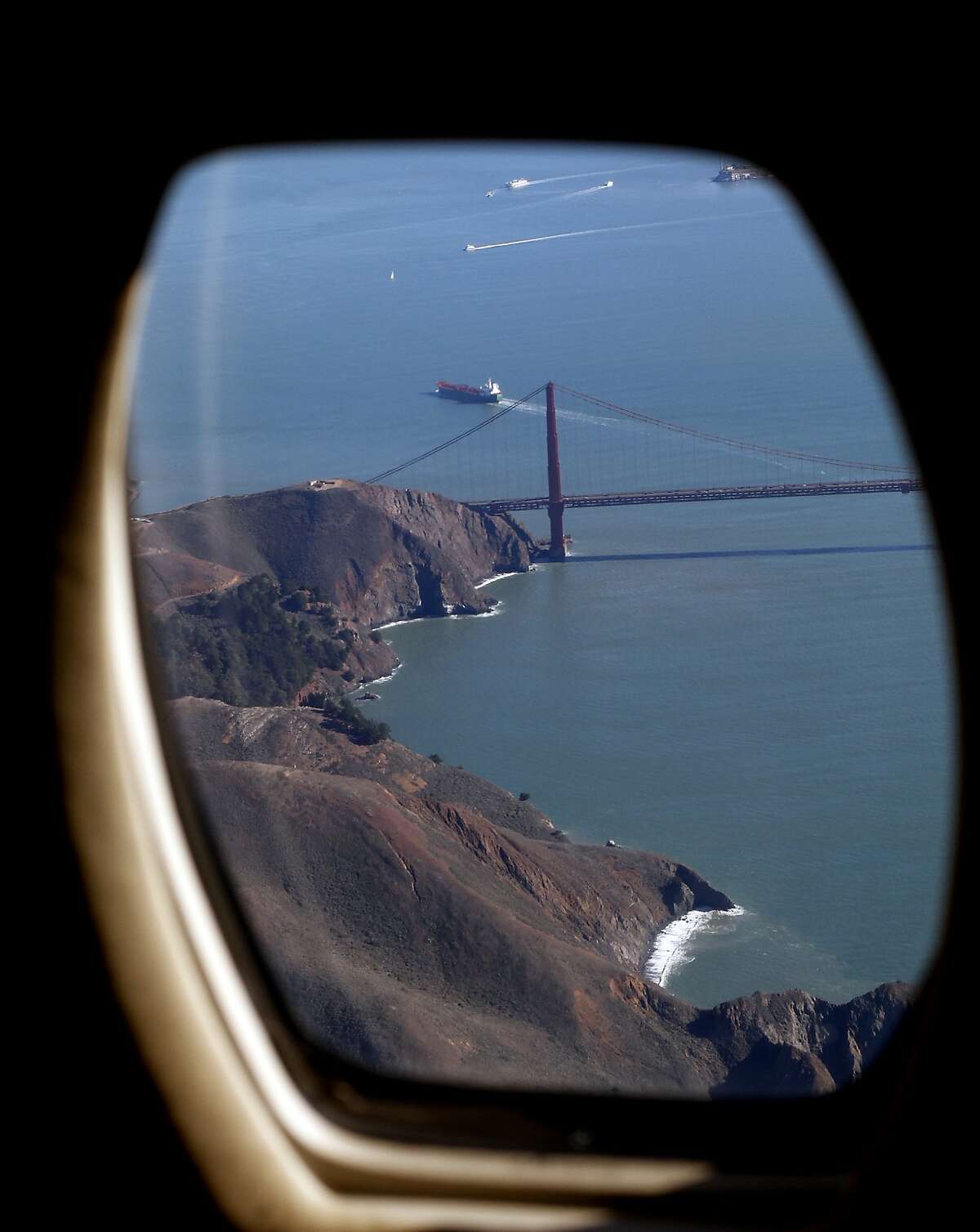 An XOJET Cessna Citation X flies over San Francisco, Calif., on Monday, January 13, 2014.