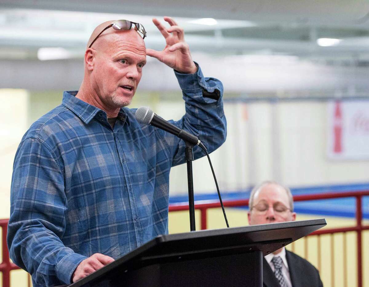 Jim McMahon, former Chicago Bears quarterback, speaks to an audience at Chelsea Piers Stamford, CT about being a patient of Dr. Scott Rosa, a cranio-cervical specialist, and Dr. Rosa's procedure on treating cranio-cervical issues. Thursday, January, 16th, 2014.