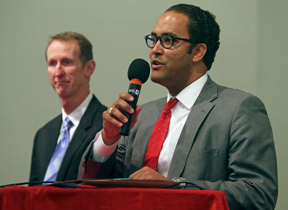 Republican candidates Robert Lowry (left) and Will Hurd meet on January 16, 2014 to debate issues at the Firefighters Banquet Hallas they campaign for the District 23 U.S. representative seat.