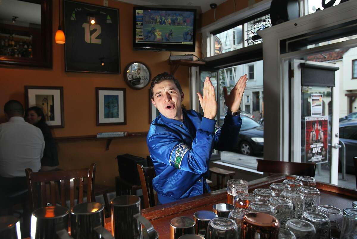 Local Seattle Seahawks fan Jerome Zech, 30, pictured Jan. 16, 2014 at Danny Coyle's in San Francisco, Calif. Zech, who was raised in Seattle as a Seahawks fan, started coming to the Irish pub about 6 years ago on Sundays to watch football. After a few years, he started promoting the bar to other Seahawks fans. Today the bar is a known Seahawks haven, attracting droves of the Seattle fans on the weekends. This weekend Zech is estimating that throughout the day there may be as many as 200 people who will come and go from the bar for the game against the 49ers.
