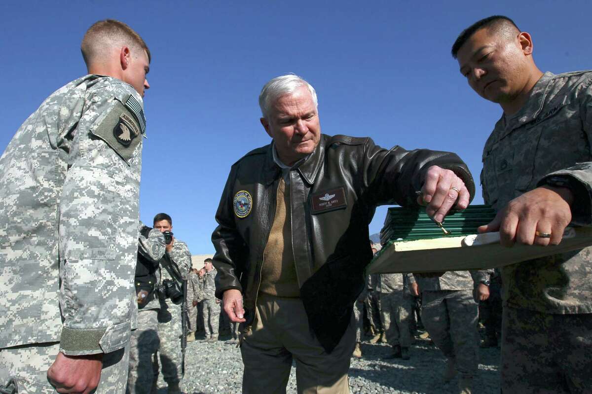 Defense Secretary Robert M. Gates, center, seen visiting troops in Kunar Province, Afghanistan, in 2010, wasn't afraid to show his affection for the men and women serving in the military.
