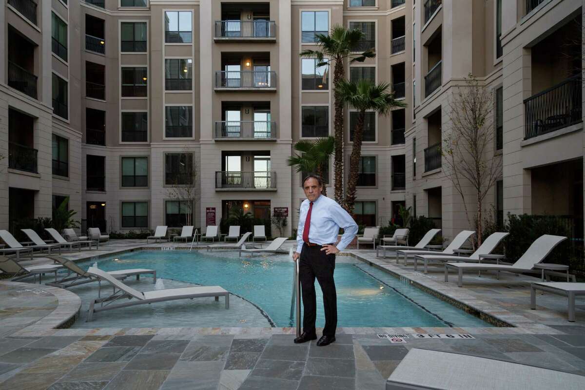 Marvy Finger poses for a portrait in one of the courtyard areas at 2900 West Dallas, a new apartment complex that recently opened near the Whole Foods on Waugh has taken resident amenities to a new level, Tuesday, Jan. 14, 2014, in Houston. The apartments have four swimming pools: two for lounging, one for doing laps and a "cocktail pool." Interior amenities include a two-story fitness center and a 24-hour emergency maintenance service. ( Michael Paulsen / Houston Chronicle )