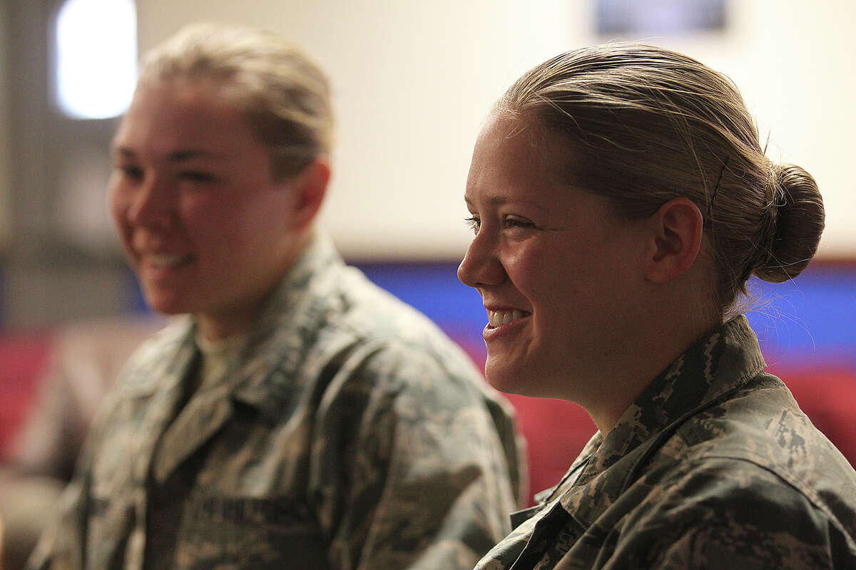 U.S. Air Force recruits Kayla Hawkins, 20, right, of Desert Hills, Arizona and Eran (cq) Menard, 18, of Sault Ste. Marie, Michigan, talk with media at Lackland Air Force Base, Sunday, Jan. 19, 2014. The recruits were recounting their encounter with bats in their dorm at the Peterson Training Complex on base. A total of 205 female recruits were started a series of rabies vaccinations.