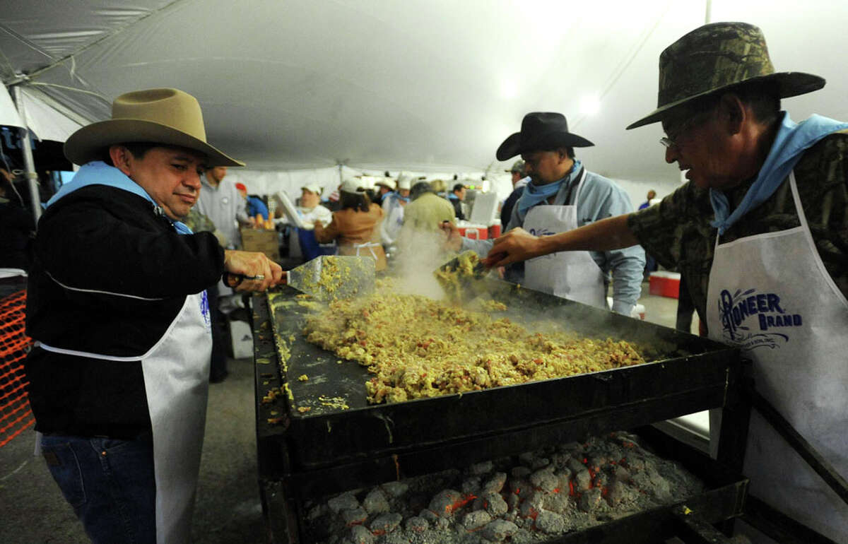 San Antonio's Cowboy Breakfast is known for its early start, its often bad weather and its sheer volume of, well, everything! Here's a look at the numbers that go into making the Alamo City's favorite free breakfast. The 2015 Cowboy Breakfast will be Friday, Jan. 30, from 4:30 a.m. to 8:30 a.m. in front of Cowboys Dancehall, 3030 N.E. Loop 410. Sources: Cowboy Breakfast and San Antonio Express-News archives