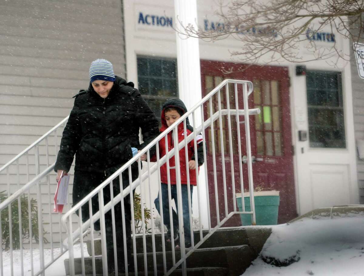 Anna Almonte picks up her son, Alexander, 4, from pre-school at Action Learning Center on Balmforth Avenue in Danbury, Conn. Tuesday afternoon, January 21, 2014. The school recently lost its acreditation, which means a loss in state funding will result.