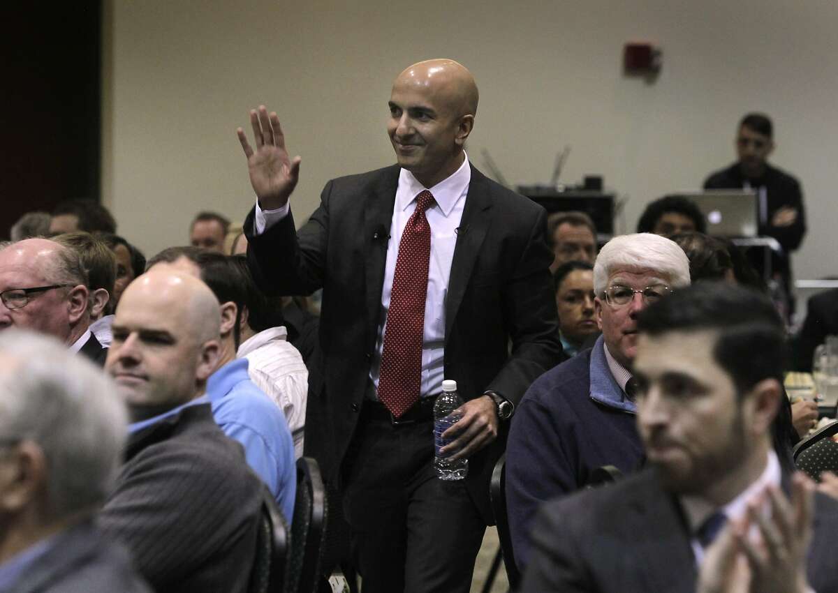 Former Assistant Treasury Secretary Neel Kashkari walks to the podium to give a keynote speech to announce his Republican candidacy for the California governor's office during a meeting of local business leaders in Sacramento, Calif. on Tuesday, Jan. 22, 2014.
