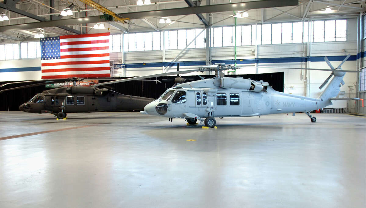 Sikorsky's UH-60M Black Hawk for the U.S. Army (left), and MH-60S Seahawk for the U.S. Navy (right), seen here in the Military Hangar at Sikorsky Aircraft in Stratford, Conn. Feb. 20, 2008.