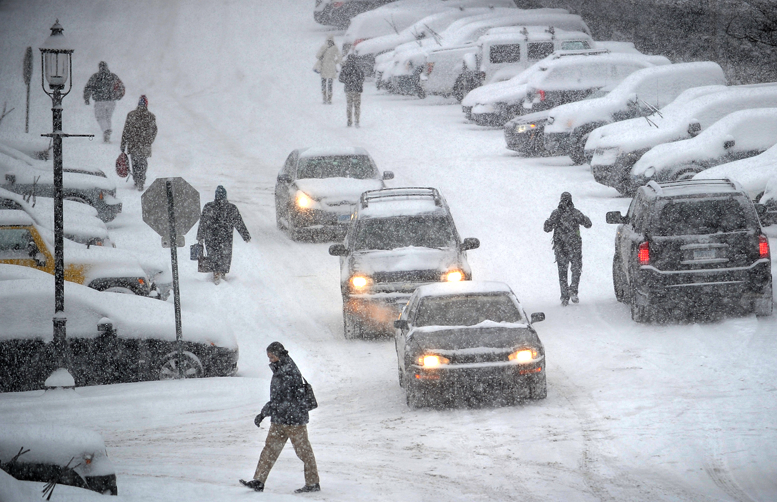 Storm brings snow, biting cold