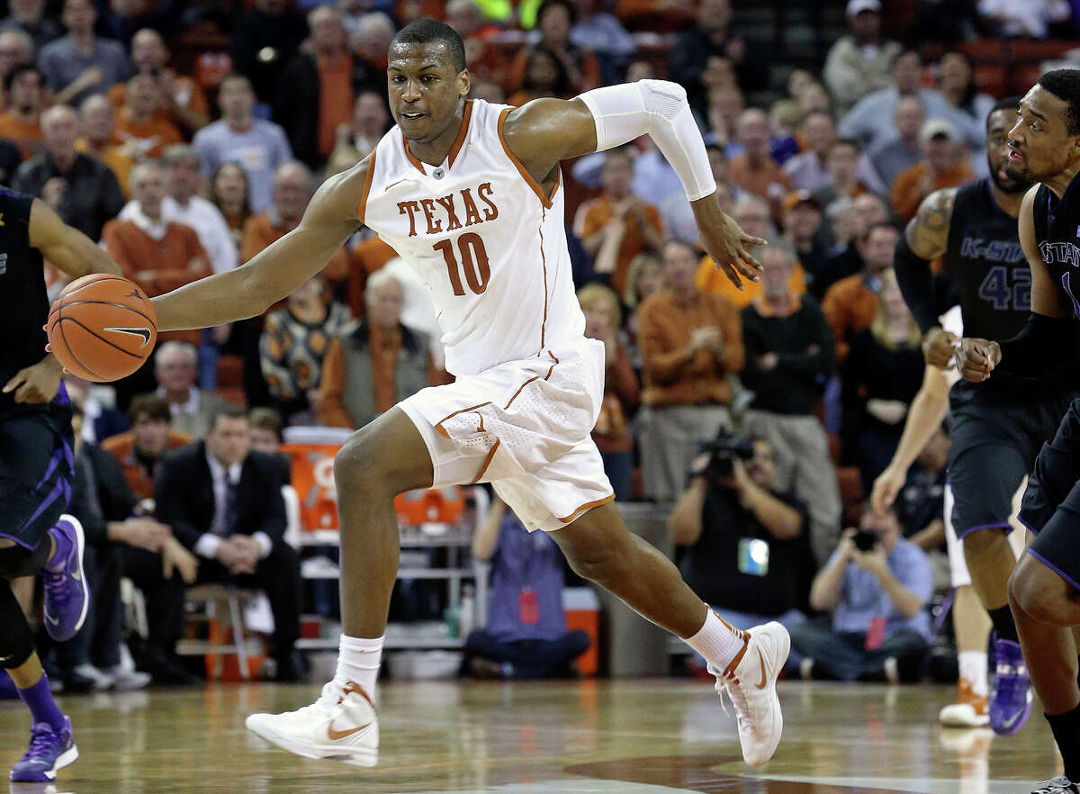 Johnathan Holmes breaks away with a steal in the final minutes as UT hosts Kansas State at the Erwin Center in Austin on January 21, 2014.
