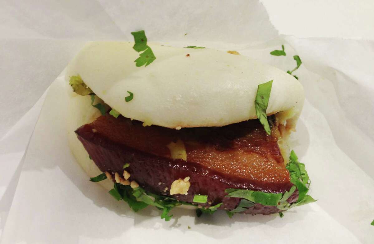 Tender Pork Belly Bao, The Chairman   In The Chairman’s Pork Belly Bao, red miso-glazed pork belly sits atop a pillow-like bun. Though these bao may be small, they pack a powerful punch. Customers have two options as to how they like their bao: steamed or baked. For optimal bao fluffiness (and for a larger bun in general), we recommend baked.    “For bao lovers, there is no greater food truck in the Bay Area,” said Katie Dowd, SFGATE senior producer. “Plus, 2-3 buns fills you up quick, making it one of the better lunch deals to be found in downtown.” Each bao runs at about $3.75 a piece, so keeping lunch under $10 is pleasantly possible.   Chef Hiroo Nagahara began the Chairman truck in 2010, wanting to employ high-end culinary techniques into the fast-paced environment of street food. The Chairman also opened a brick-and-mortar in the Tenderloin in 2015.    Fun fact: Taiwanese-American artist James Jean designed the visual branding of the restaurant and truck to be reminiscent of the art found in comic books.    The Chairman, 670 Larkin Street, San Francisco. (415) 813-8800. Website. The truck can be found here. 