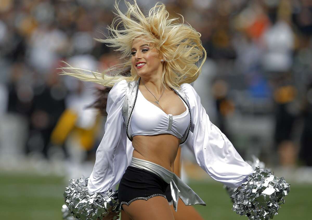 An Oakland Raiderette performs during a timeout in the first half. The Oakland Raiders played the Pittsburgh Steelers at O.co Coliseum in Oakland, Calif., on Sunday, October 27, 2013.
