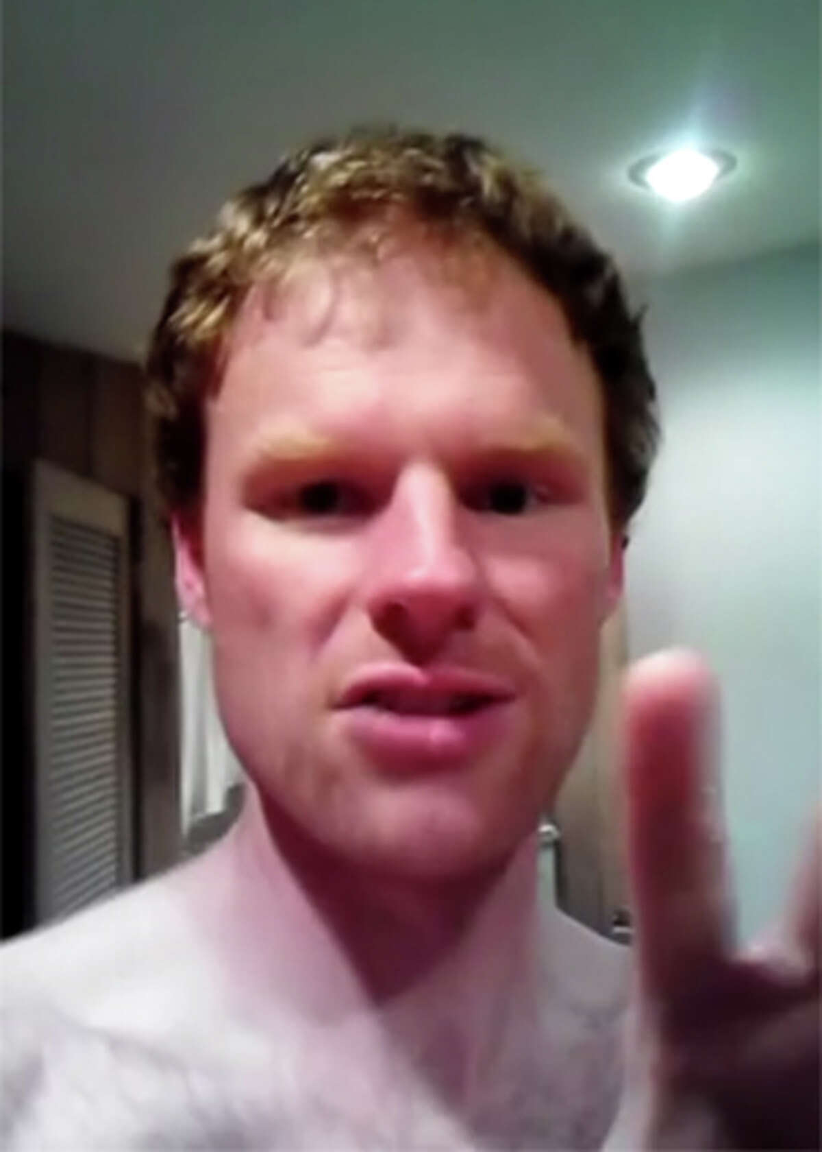 This image, taken from a video posted to Youtube, shows Mitchell Taylor, a Magnolia man charged with threatening to kill Seattle Mayor Ed Murray and councilwoman Kshama Sawant. Taylor, 32, is identified by police as the man shown in the video and others.