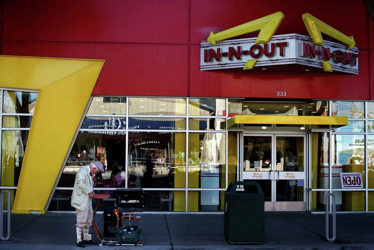 "Mr. Magic", Jerry Roy Salazar, sets up shop outside the In-N-Out at Fisherman's Wharf in San Francisco, Calif., on Friday, January 17, 2014.
