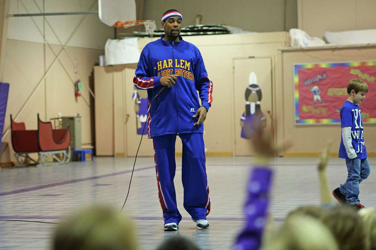 Harlem Globetrotter visits Woodcrest Elementary School in Port Neches