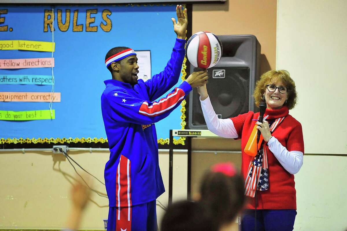 Harlem Globetrotter visits Woodcrest Elementary School in Port Neches