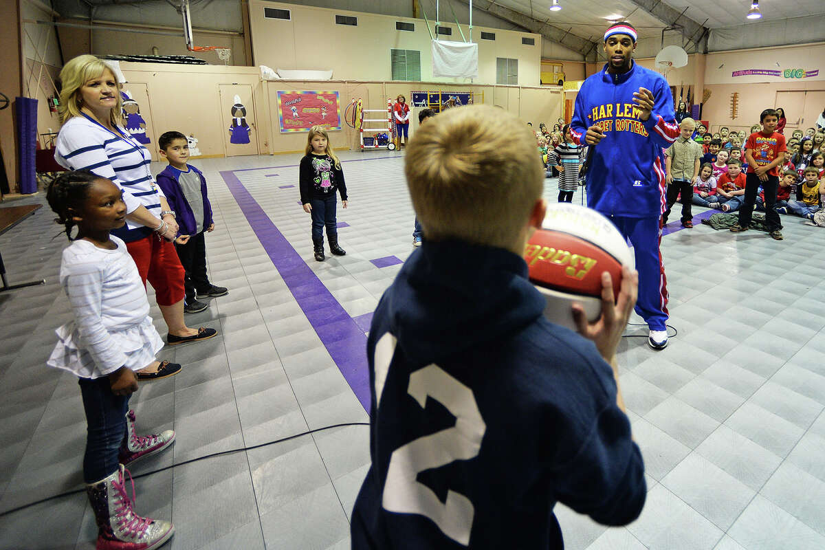 Harlem Globetrotter visits Woodcrest Elementary School in Port Neches