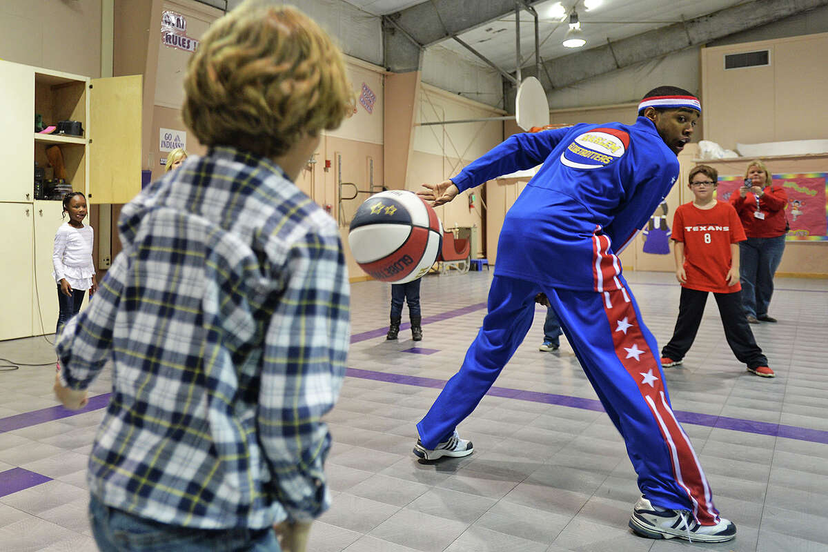 Harlem Globetrotter visits Woodcrest Elementary School in Port Neches