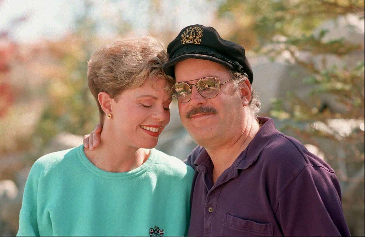 File-This Oct. 25, 1995 file photo shows Toni Tennille, left, and Daryl Dragon, the singing duo The Captain and Tennille, posing during an interview in at their home in Washoe Valley, south of Reno, Nevada. Court documents filed by Tennille in Arizona say that her marriage to Dragon is irretrievably broken and cannot be reconciled. The two have been married for more than 38 years. The popular 1970s pop duo's hits include "Love Will Keep Us Together," which earned a Grammy for record of the year in 1975. (AP Photo/David B. Parker, File) ORG XMIT: LA104