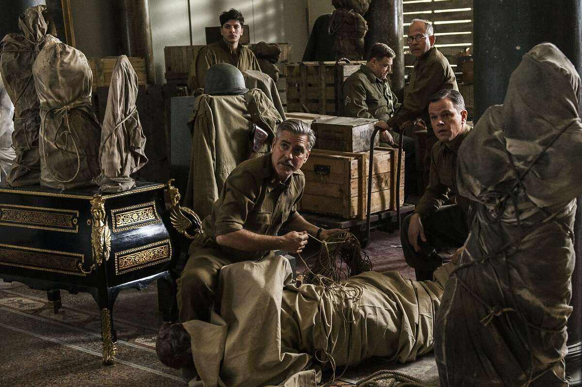 (l to r) Sam Epstein, George Clooney, John Goodman, Bob Balaban and Matt Damon in Columbia Pictures' THE MONUMENTS MEN. PHOTO BY: Claudette Barius COPYRIGHT: © 2013 Columbia Pictures (l to r) Sam Epstein, George Clooney, John Goodman, Bob Balaban and Matt Damon in Columbia Pictures' THE MONUMENTS MEN.