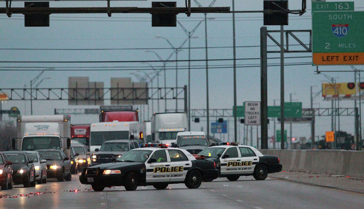 Traffic is diverted off of IH-35 northbound at Walzem Road Friday January 24, 2014 because of iced over bridges.