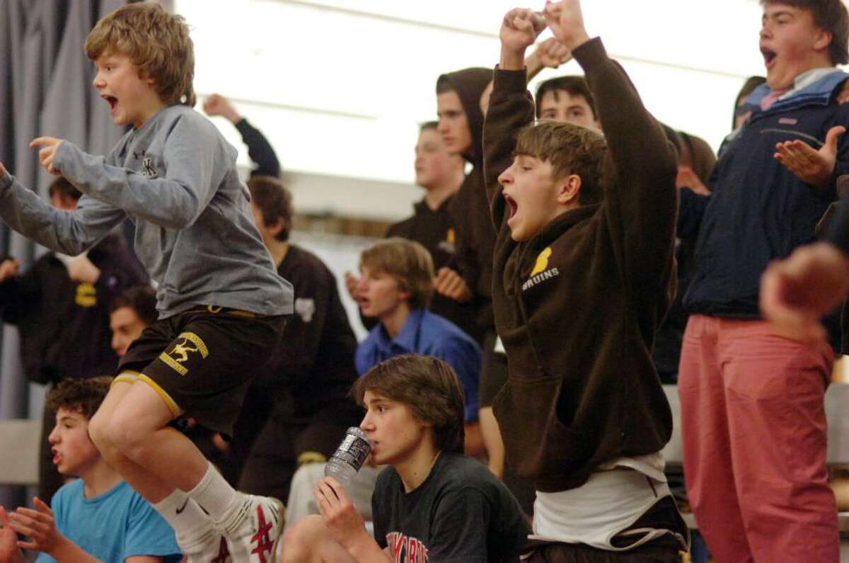 Bruins react as Brunswick School hosts Greenwich High in a crosstown wrestling match Thursday evening, Feb. 4, 2010.