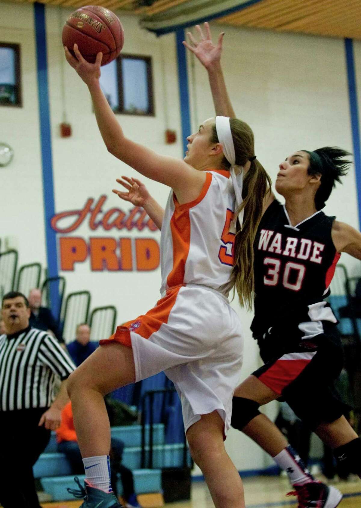 Danbury High School's Rachel Gartner goes up for the basket in a game against Fairfield Warde High School, played at Danbury. Friday, Jan. 24, 2014