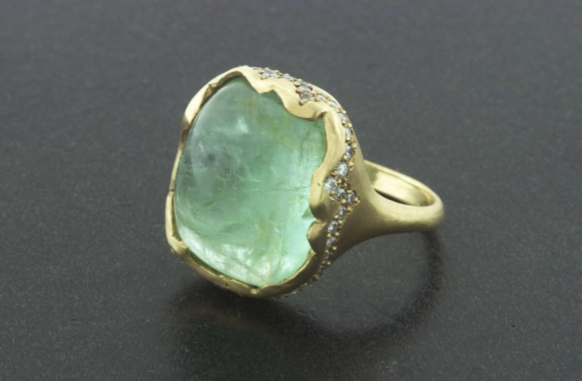 Burlingame jewelry maker Christine Guibara is influenced by nature's patterns, colors and textures. This ring in 18K gold with diamond rim and a green beryl cabochon retails for $7,860 at www.christineguibara.com.