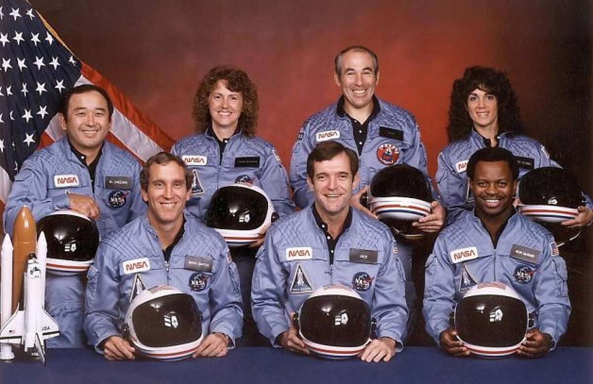 The astronauts who died aboard the space shuttle Challenger. Front row from left are: Mike Smith, Dick Scobee, Ron McNair. Back row from left: Ellison Onizuka, schoolteacher Christa McAuliffe, Greg Jarvis, and Judith Resnik.