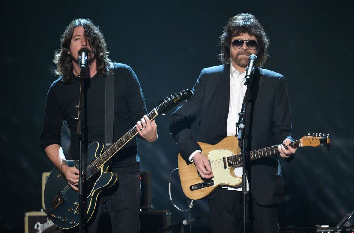 ELO's Jeff Lynne performs onstage with Dave Grohl during "The Night That Changed America: A GRAMMY Salute To The Beatles" at the Los Angeles Convention Center on January 27, 2014 in Los Angeles, California. See when your favorite rock acts first played Houston...