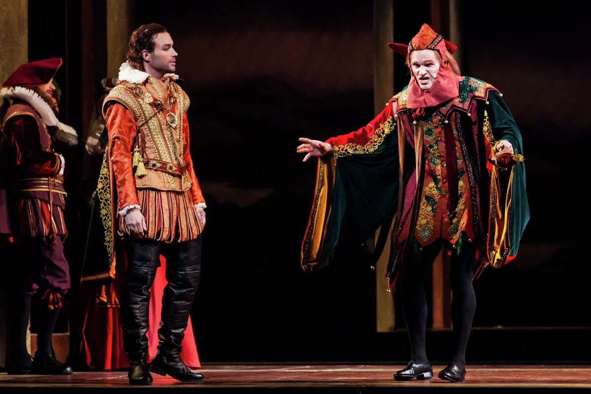 Stephen Costello, left, plays the Duke of Mantua and Ryan McKinny is "Rigoletto."