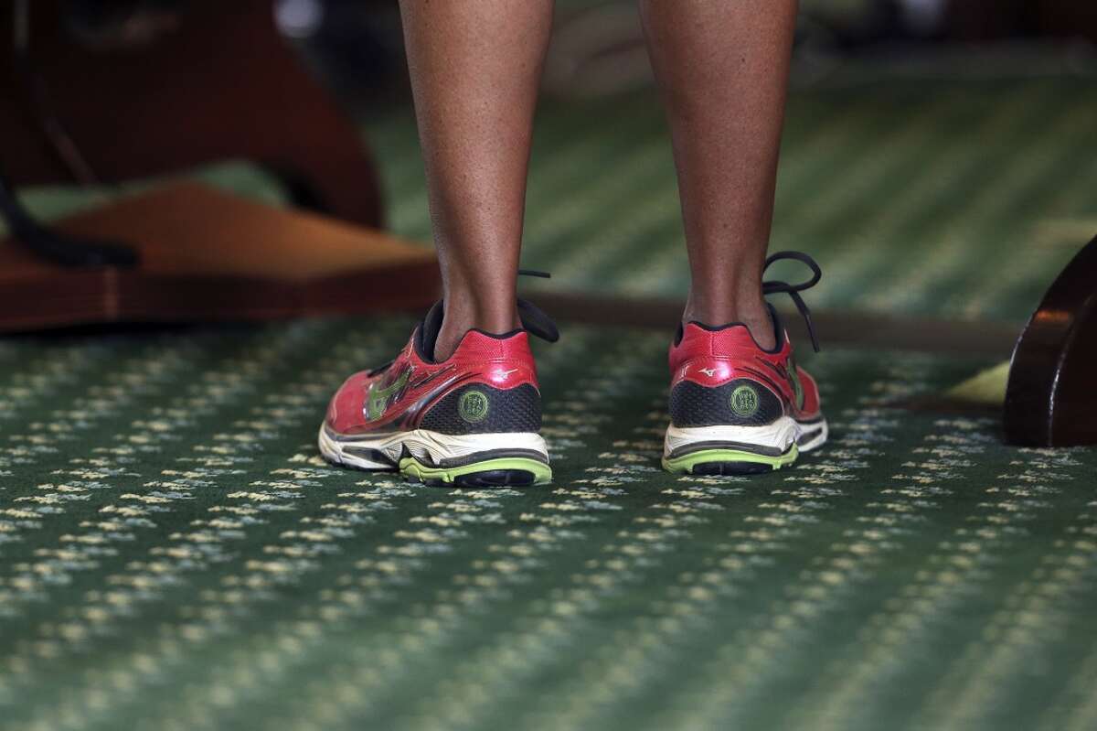Her pink sneakers become an icon for Fort Worth Sen. Wendy Davis' filibuster.