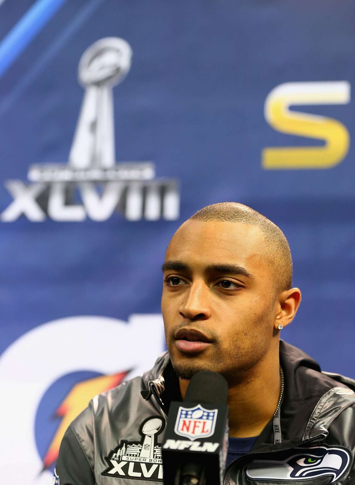 Sports people: Doug Baldwin, Deion Sanders