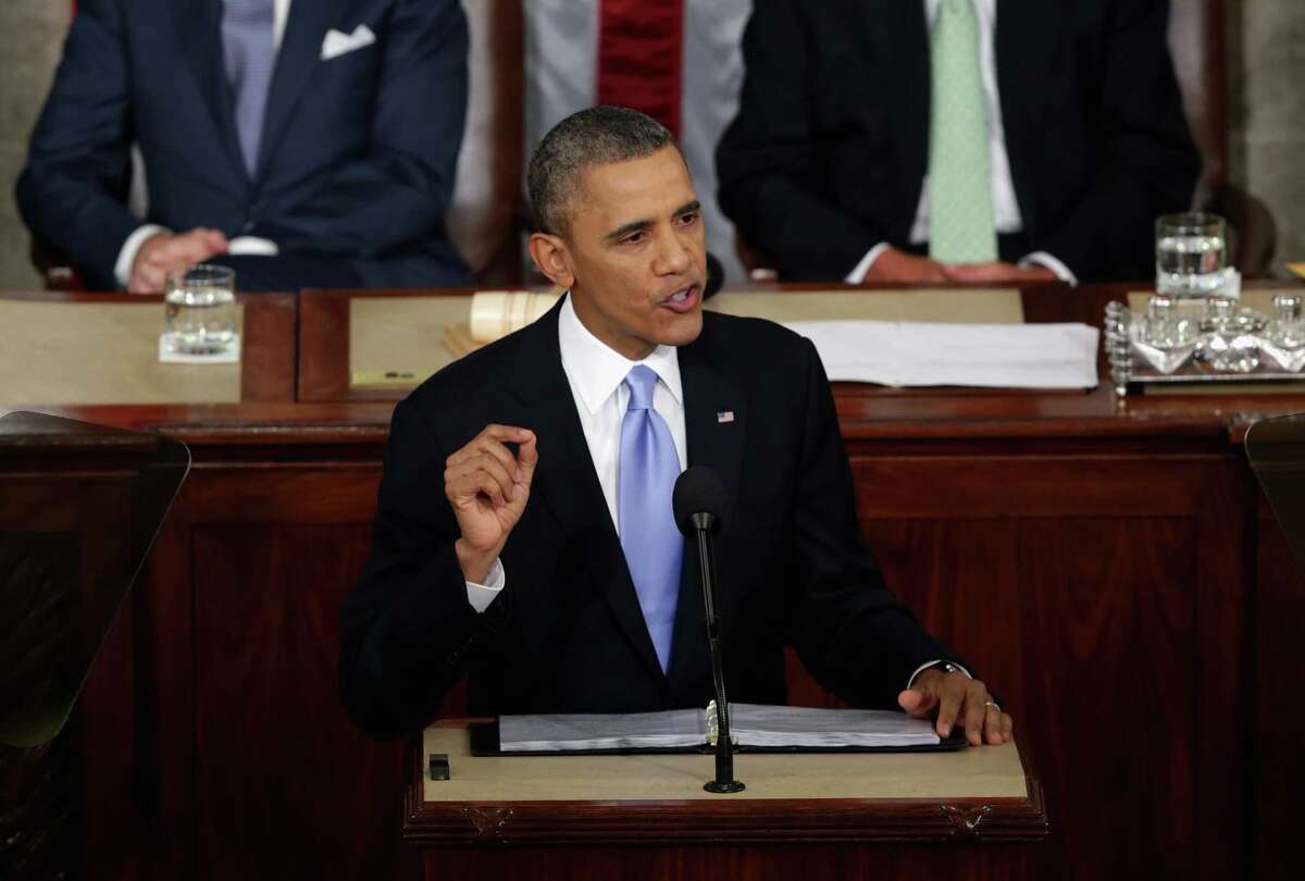 WASHINGTON, DC - JANUARY 28: U.S. President Barack Obama delivers the State of the Union address to a joint session of Congress in the House Chamber at the U.S. Capitol on January 28, 2014 in Washington, DC. In his fifth State of the Union address, Obama is expected to emphasize on healthcare, economic fairness and new initiatives designed to stimulate the U.S. economy with bipartisan cooperation. (Photo by Alex Wong/Getty Images)