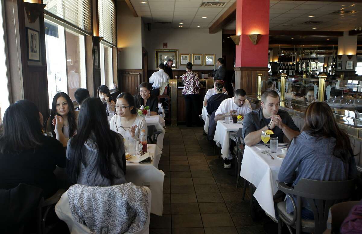 Diners enjoy the lunch service at Delancey Street Restaurant in San Francisco, Calif. on Saturday, Jan. 25, 2014.