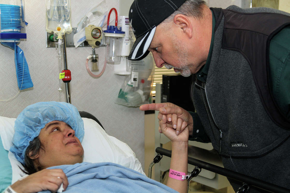 Rene Yanez, with his daughter Rachel Villarreal moments before she is taken in to surgery Wed. Jan. 29, 2014 at tthe Methodist Specialty and Transplant Hospital. Villarreal is the aunt of photographer Alma Hernandez who took the picture.