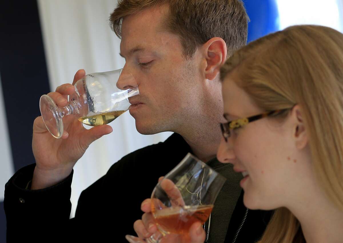 David Shelton (left) and Anna Bartley partake in a mead tasting Sunday January 5, 2014 in San Francisco, Calif. The San Francisco Mead Company is making and producing high quality mead in the Bayview district.