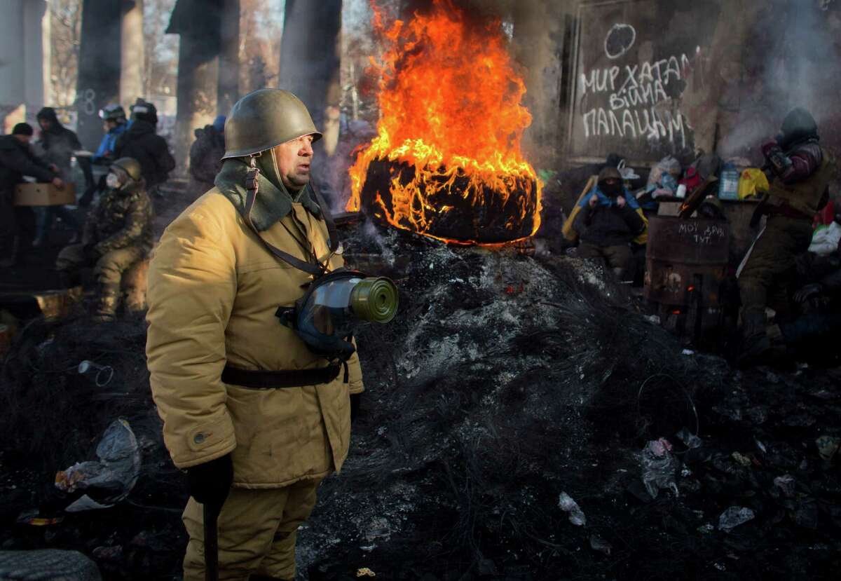 The opposition protests continue in Kiev, Ukraine, on Thursday. Some in the opposition ranks doubt reports of President Viktor Yanukovych's absence.