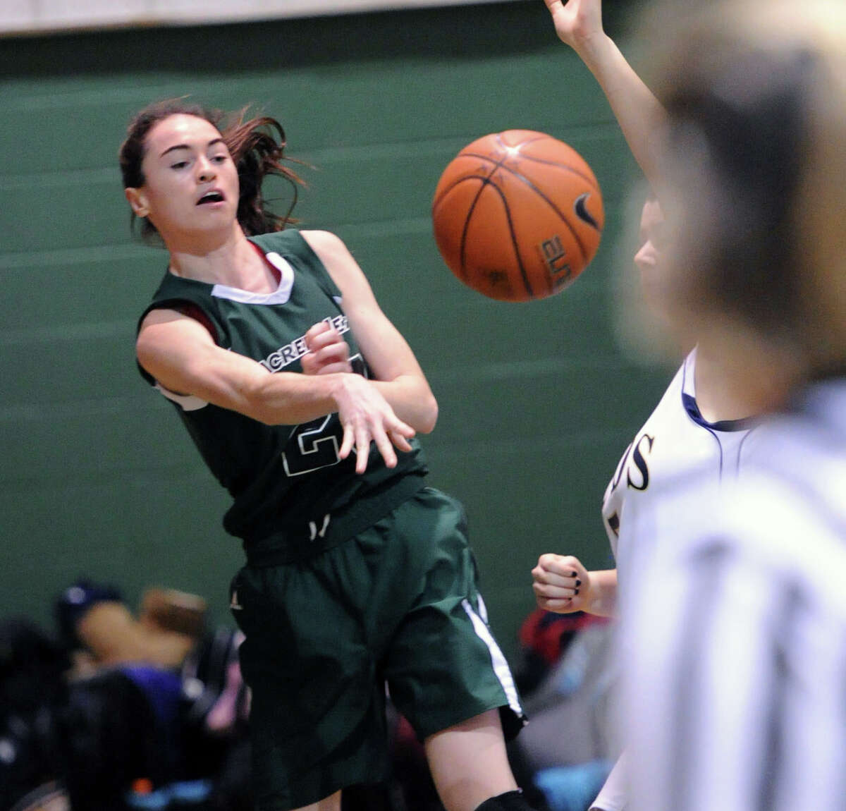 Colleen O'Neill (#23) of Convent of the Sacred Heart passes during the high school basketball game between Convent of the Sacred Heart and Rye Country Day School at Convent in Greenwich, Thursday, Jan. 30, 2014.