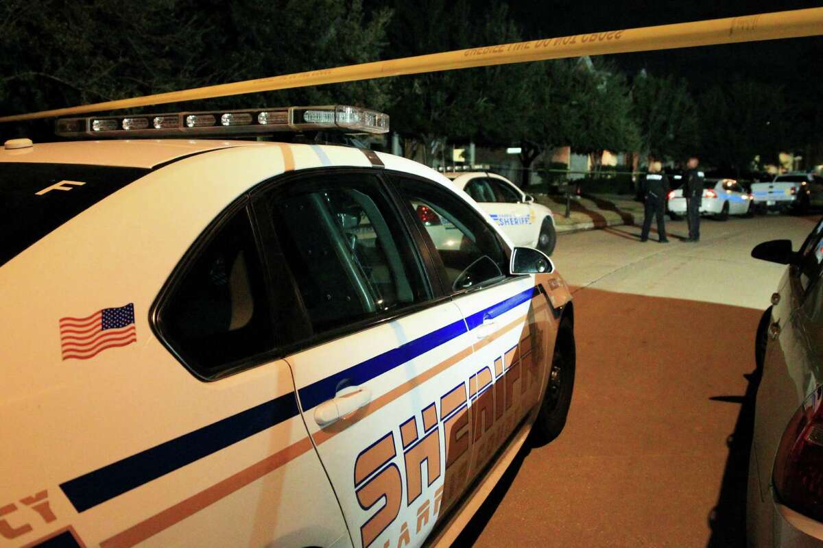Harris County deputies work a homicide scene in northwest Harris County in 2014.