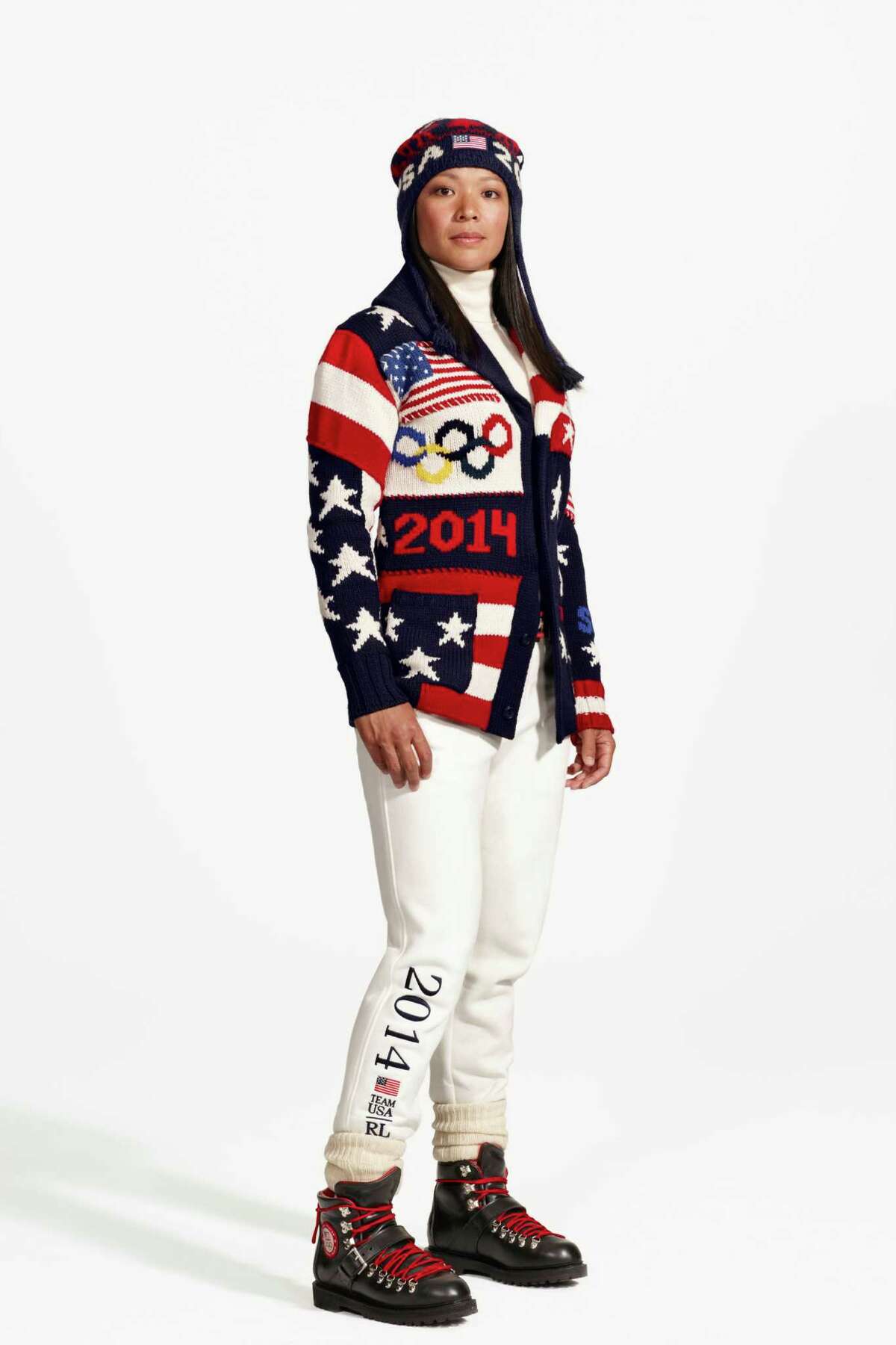 This product image released by Ralph Lauren shows American Olympic ice hockey player Julie Chu wearing the official uniform for Team USA to be worn at the opening ceremony for the 2014 Winter Olympic games in Sochi, Russia. Every article of clothing made by Ralph Lauren for the U.S. Winter Olympic athletes in Sochi, including their opening and closing ceremony uniforms and their Olympic Village gear, has been made by domestic craftsman and manufacturers. (AP Photo/Ralph Lauren)