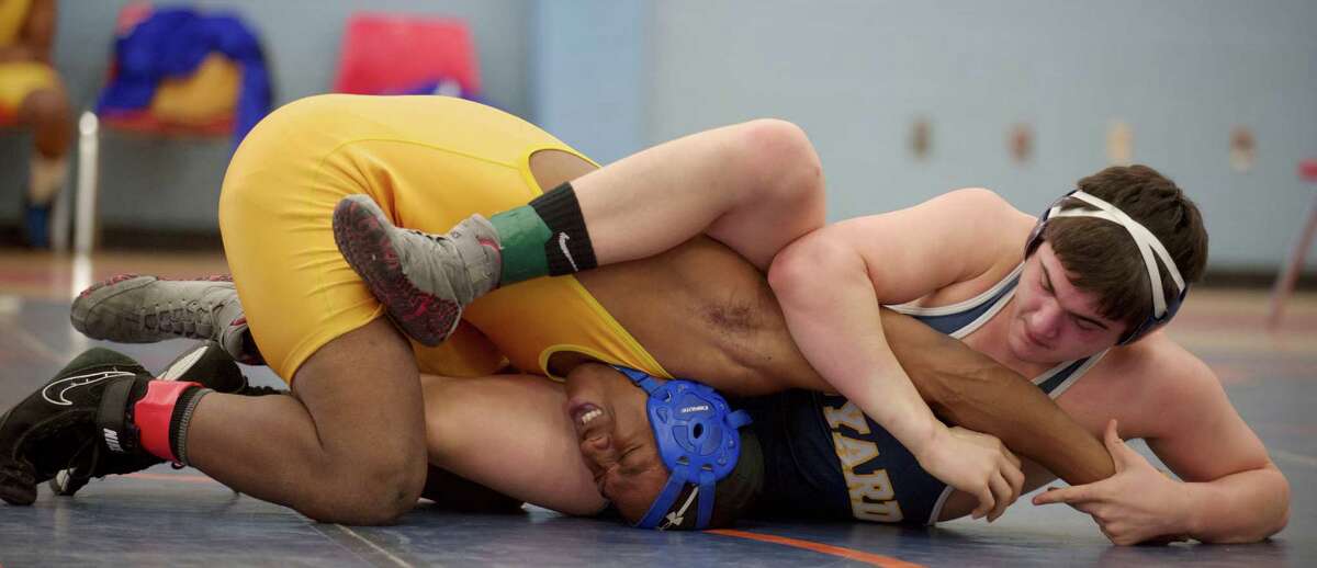 Lenyard's Danny Contino, right, and Harding's Kason Taylor wrestle during New Fairfield High School's Duals Tournament, on Saturday, February 1, 2014, in New Fairfield, Conn. They are competing in the 182 lb. class.