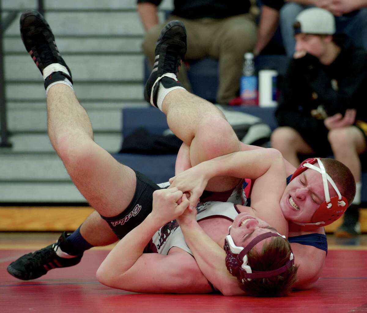 New Fairfield's Joe Alesi, right, and Bethel's Quinn Vissak wrestle during New Fairfield High School's Duals Tournament, on Saturday, February 1, 2014, in New Fairfield, Conn. They are competing in the 220 lb. class.