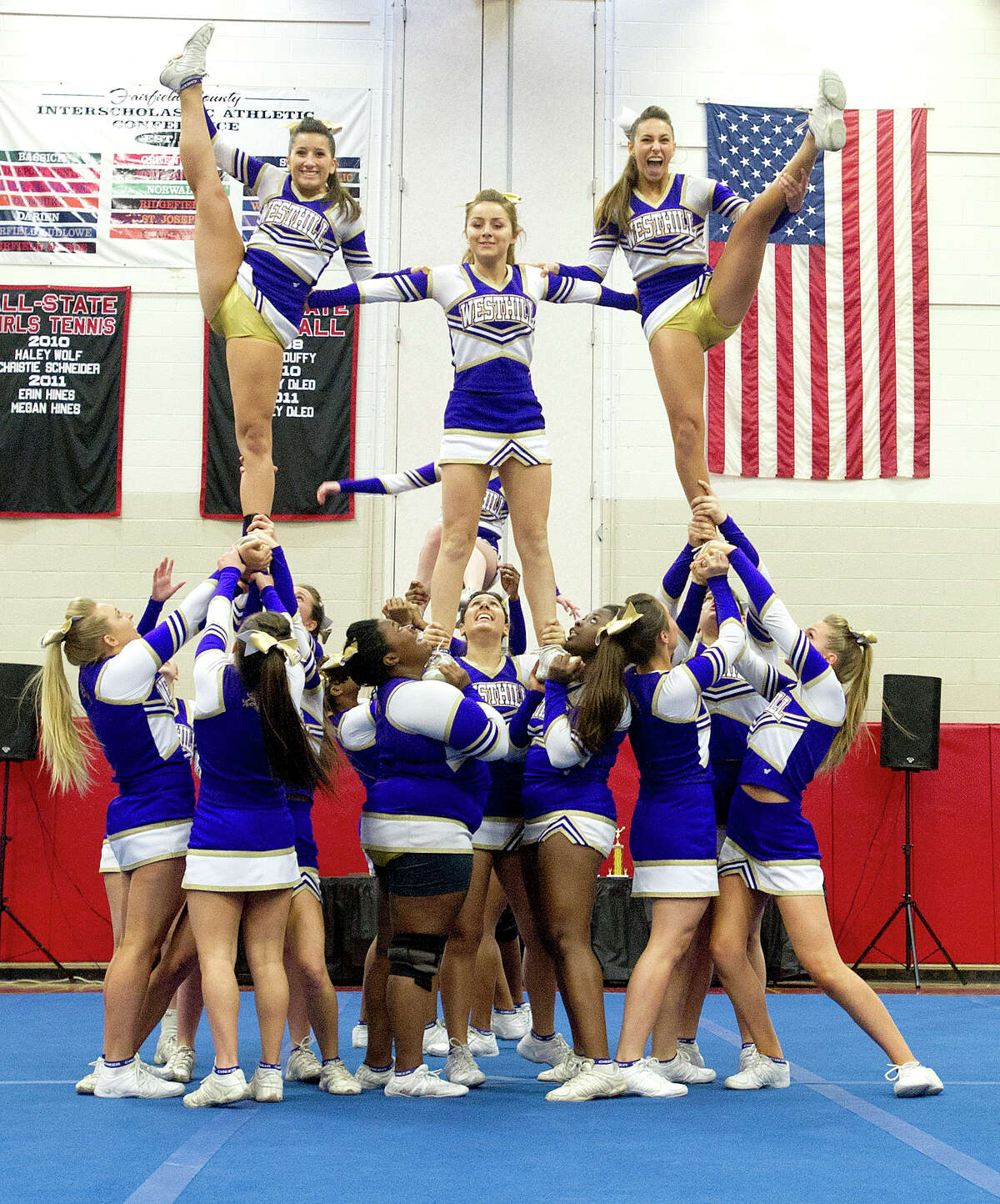 Westhill High School competes in the FCIAC cheerleading championships at Fairfield Warde High School in Fairfield, Conn., on Saturday, February 1, 2014.