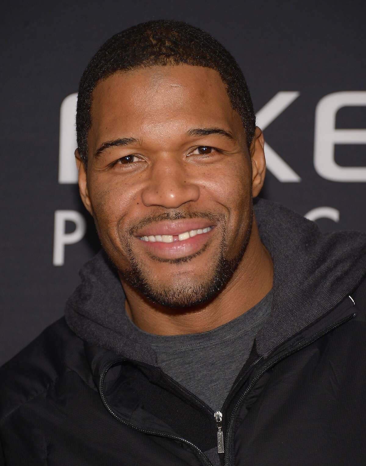 NEW YORK, NY - JANUARY 31: Michael Strahan attends the ESPN The Party at Basketball City - Pier 36 - South Street on January 31, 2014 in New York City. (Photo by Michael Loccisano/Getty Images For ESPN)
