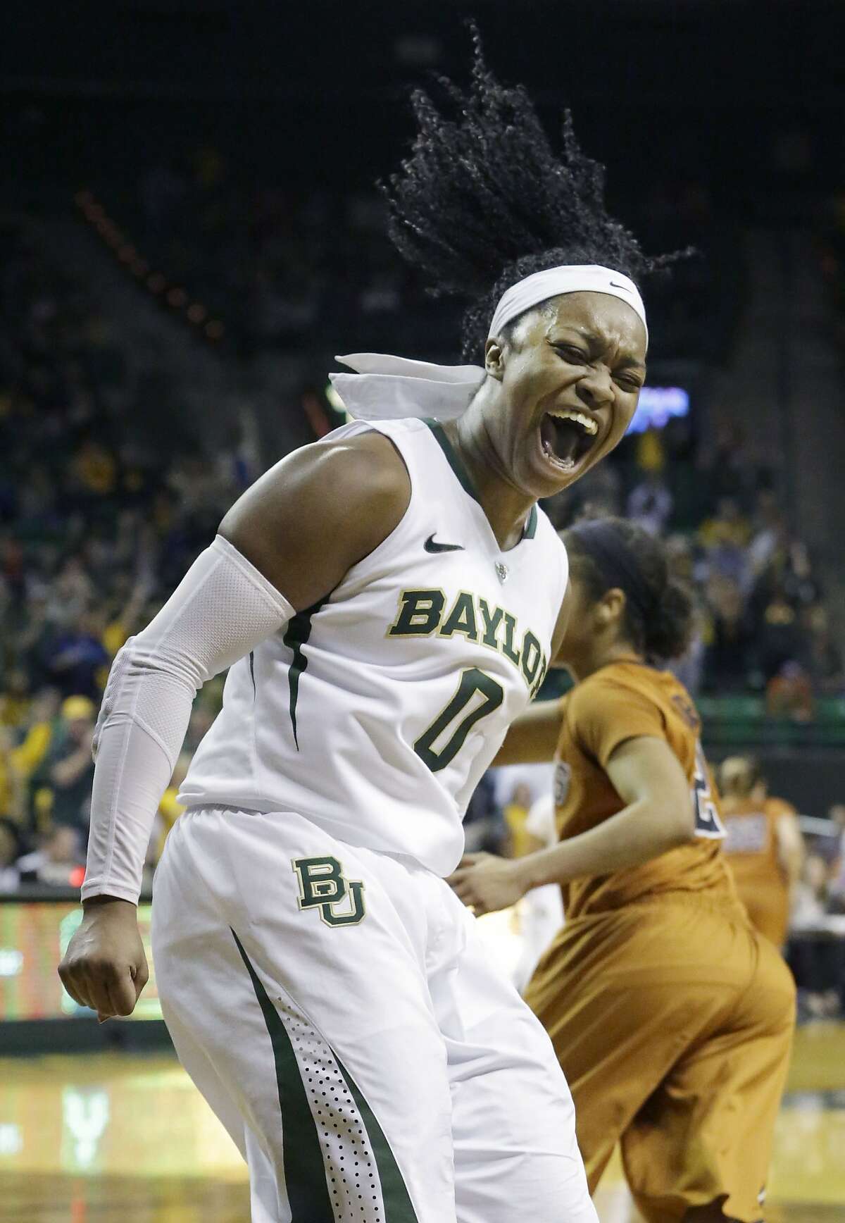 Baylor guard Odyssey Sims (0) reacts to scoring during the second half of an NCAA college basketball game against Texas, Saturday, Feb. 1, 2014, in Waco, Texas. Sims scored 44 points in the Baylor 87-73 win.