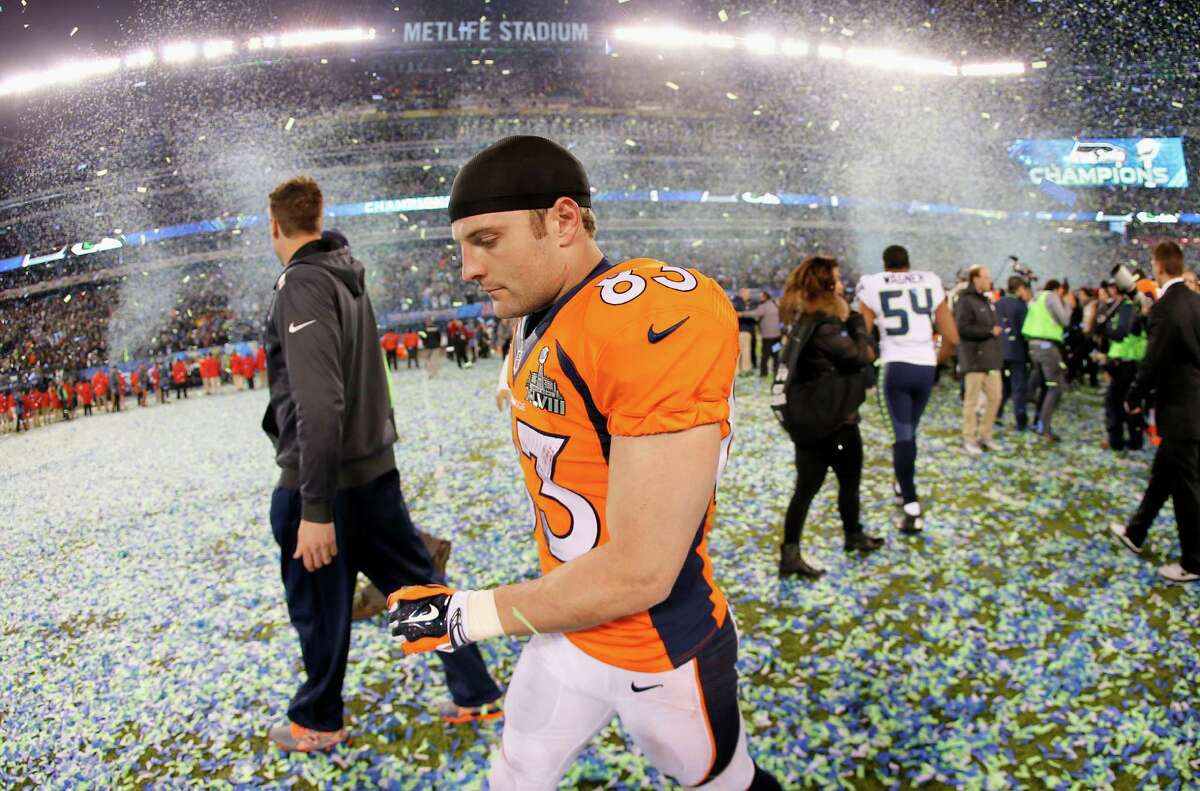 Denver Broncos quarterback Peyton Manning (18) drops back to pass against  the Seattle Seahawks at the Super Bowl XLVIII at MetLife Stadium in East  Rutherford, New Jersey on February 2, 2014. MetLife